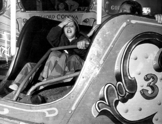 Glasgow Times: Not everyone was delighted after a trip on the waltzers. December 1977. Pic: Newsquest